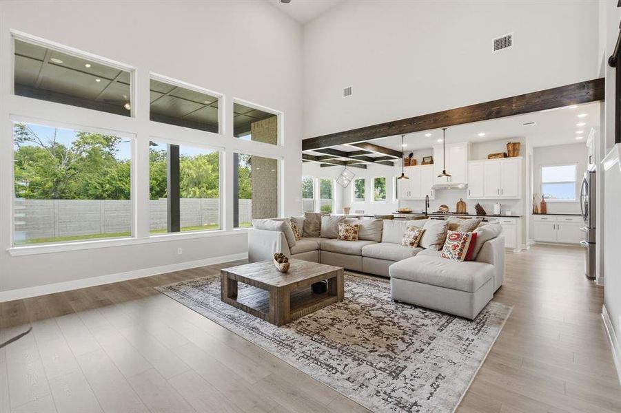 What A View, Both Inside And Out!  Outstanding Open Living Space With Abundant Natural Light.  You'll Appreciate The Convenient Electric Window Shades Too.