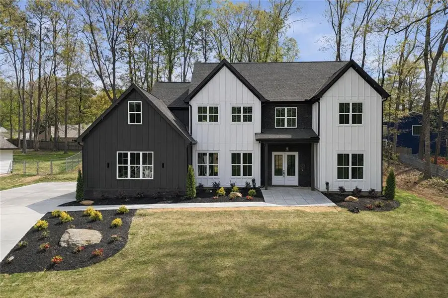 Front exterior of a new home in , Marietta, GA, highlighting curb appeal (Image 19). Front exterior of a new home in , Marietta, GA, highlighting curb appeal (Image 19).