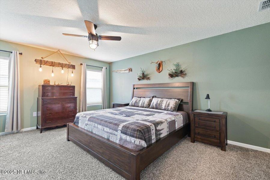 Furnished interior view inside a new home in River Glen Express, Yulee (Image 8).