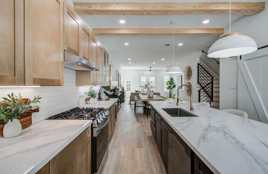 Modern meets rustic in this kitchen! Light, bright, open kitchen perfect for cooking and mingling with family, friends and guests.