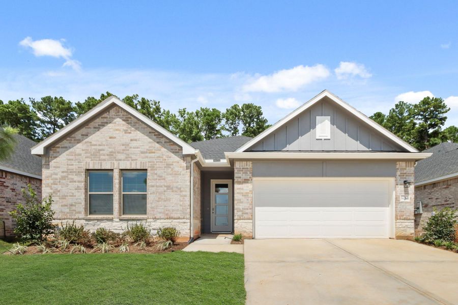 Front exterior of a new home in Westridge Cove, Conroe, TX, highlighting curb appeal (Image 1). Front exterior of a new home in Westridge Cove, Conroe, TX, highlighting curb appeal (Image 1).