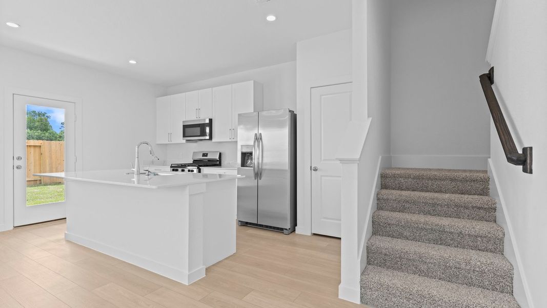 Furnished interior view inside a new home in Lexington Village, Missouri City (Image 10).