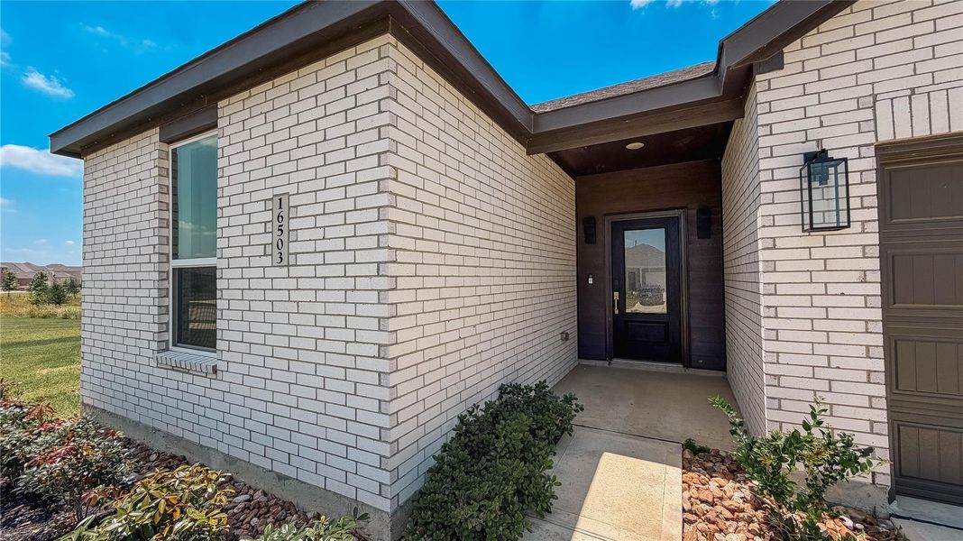 Exterior details and patio area of a home in The Grand Prairie, Hockley (Image 4).