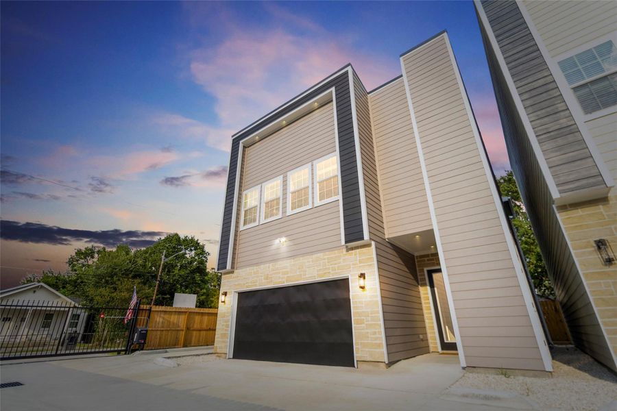 Every day starts with pride as you pull up to your modern two-story home, its bold navy accents and stonework setting the stage for a lifestyle that’s as stylish as it is comfortable. The sleek lines of your façade give your place a fresh, standout curb appeal.