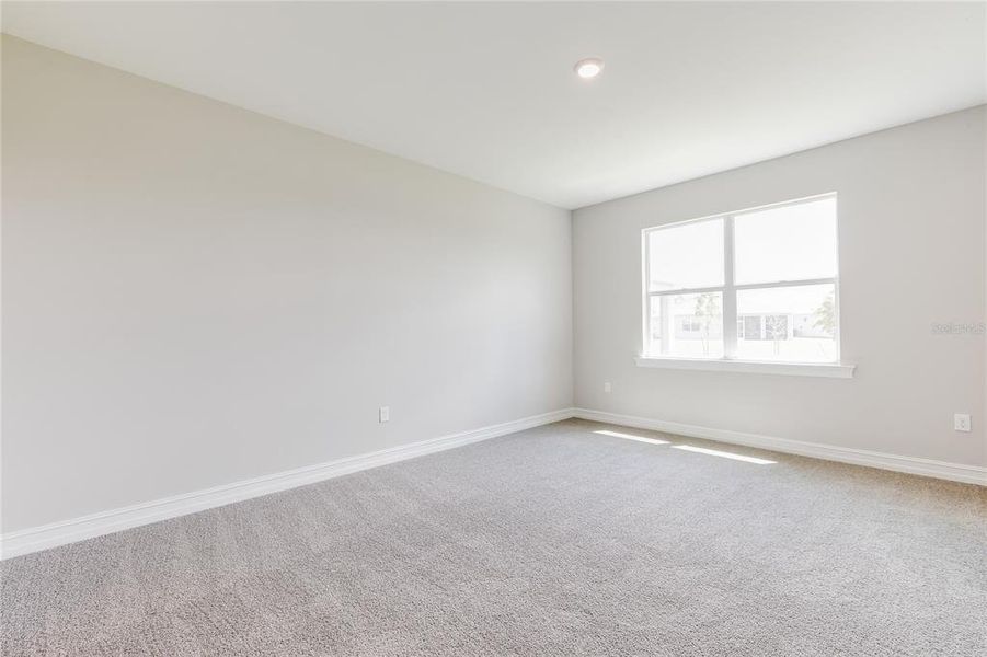 Spacious, unfurnished interior of a new home in Coral Lakes - Tradition & Express, Punta Gorda (Image 16).