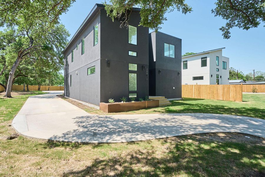 Front exterior of a new home in , Austin, TX, highlighting curb appeal (Image 2).