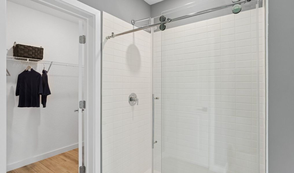 Primary bath with glass shower enclosure