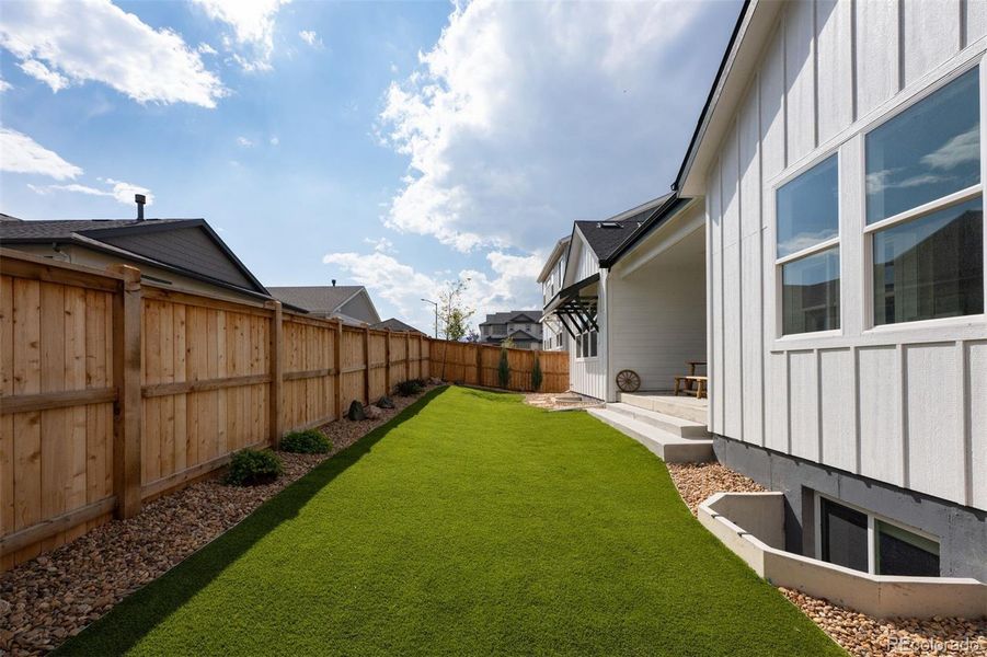Front exterior of a new home in Trailstone Destination Collection, Arvada, CO, highlighting curb appeal (Image 19).