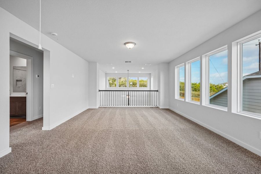 Spacious, unfurnished interior of a new home in The Meadows at Hunters Ranch, San Antonio (Image 38).