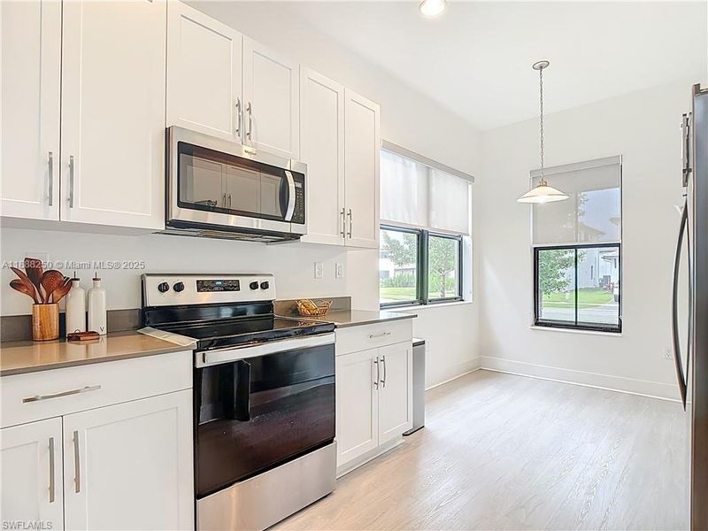 Furnished interior view inside a new home in , Ave Maria (Image 10).