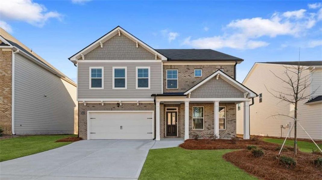 Front exterior of a new home in Water Oak Estates, Lawrenceville, GA, highlighting curb appeal (Image 1). Front exterior of a new home in Water Oak Estates, Lawrenceville, GA, highlighting curb appeal (Image 1).