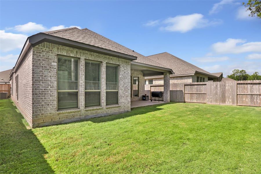 Exterior details and patio area of a home in The Highlands, Porter (Image 4).