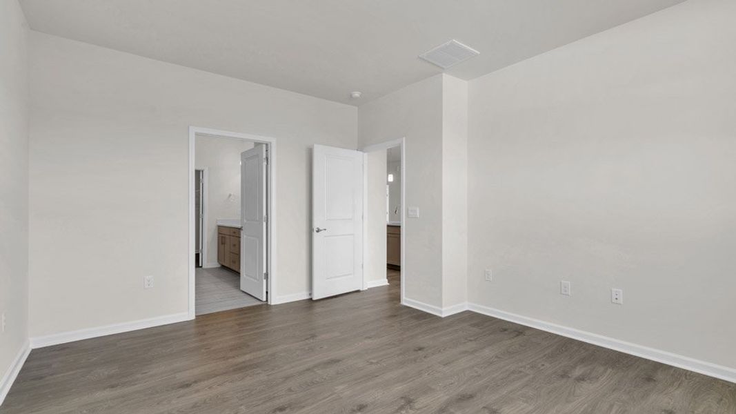 Representative unfurnished interior of a home built from the BRISTOL by D.R. Horton in The Villas at Galvins Ridge, Sanford (Image 26).