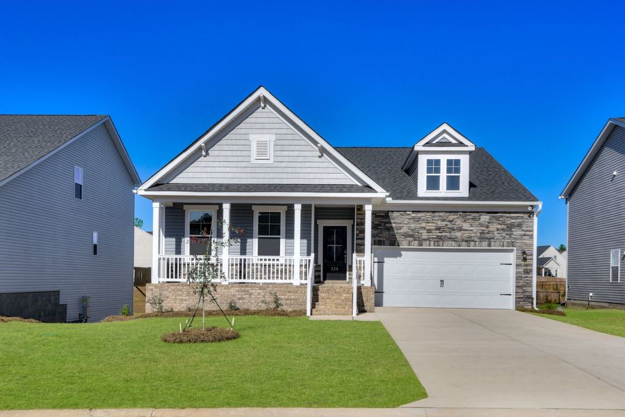 Front exterior of a new home in The Beacon at Old Peachtree Single Family Homes, Lawrenceville, GA, highlighting curb appeal (Image 49).