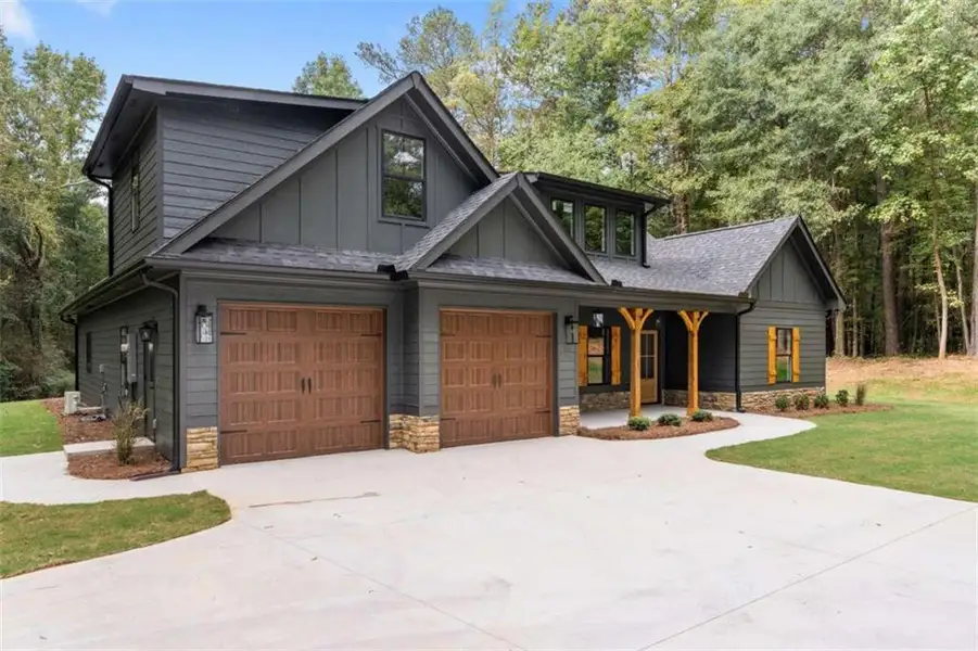 Front exterior of a new home in , Bowdon, GA, highlighting curb appeal (Image 22).