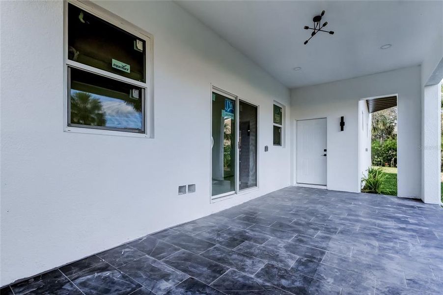 Exterior details and patio area of a home in , New Port Richey (Image 33).