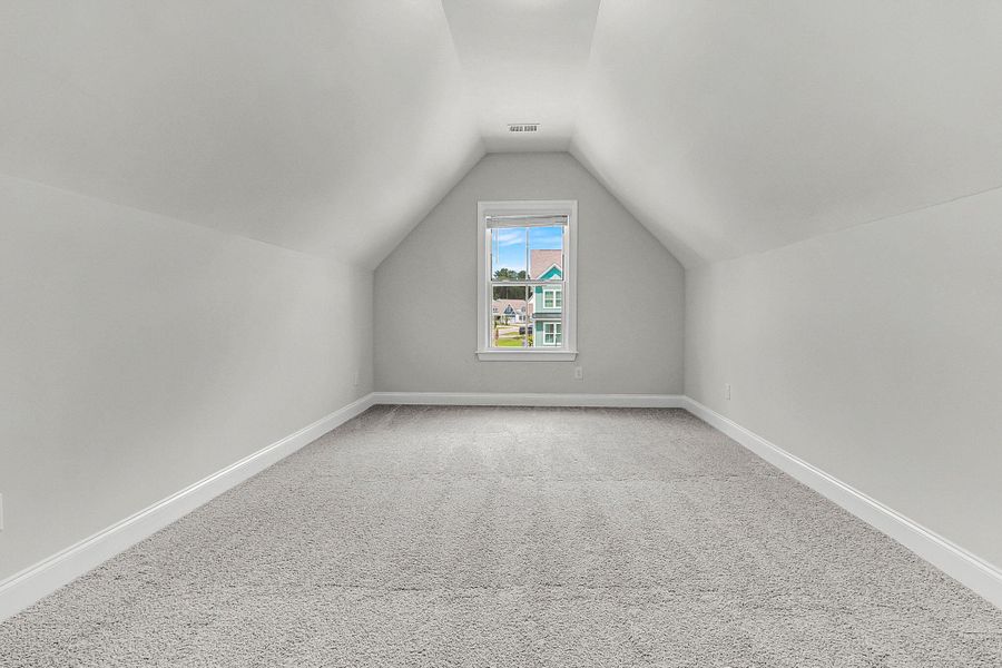 Spacious, unfurnished interior of a new home in Tidewater at Lakes of Cane Bay, Summerville (Image 28).