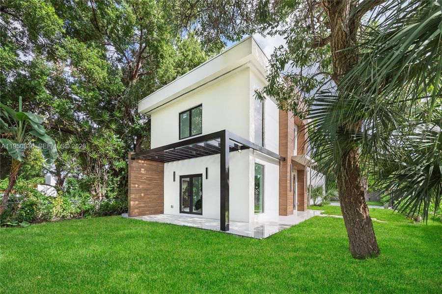 Exterior details and patio area of a home in , Miami (Image 3). Exterior details and patio area of a home in , Miami (Image 3).