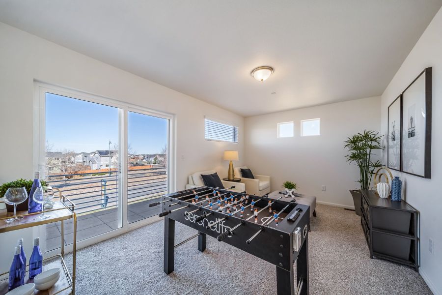Furnished interior view inside a new home in Reunion, Commerce City (Image 18).