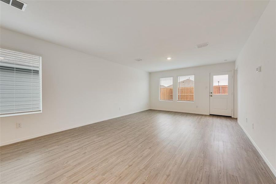 Empty room featuring light hardwood / wood-style floors