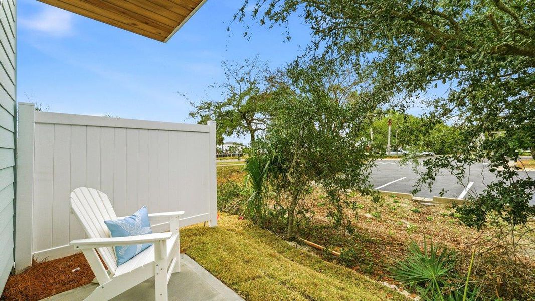 Exterior details and patio area of a home in Palm Street Townhomes, Destin (Image 3).