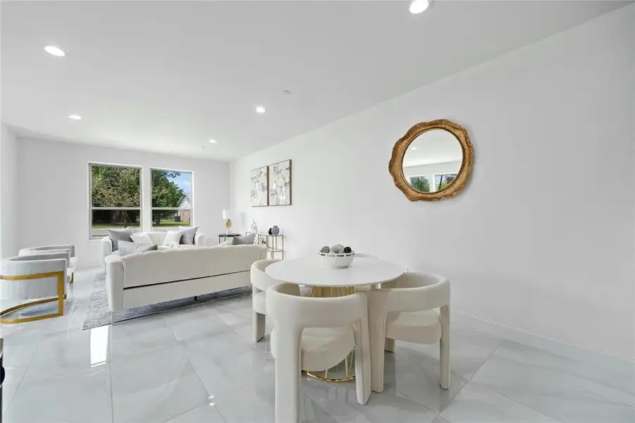Dining area featuring recessed lighting and baseboards