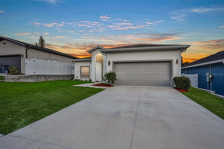 Front exterior of a new home in , New Port Richey, FL, highlighting curb appeal (Image 1).