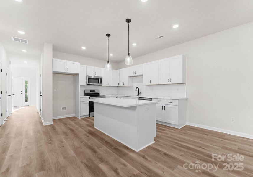 Furnished interior view inside a new home in , Charlotte (Image 8).