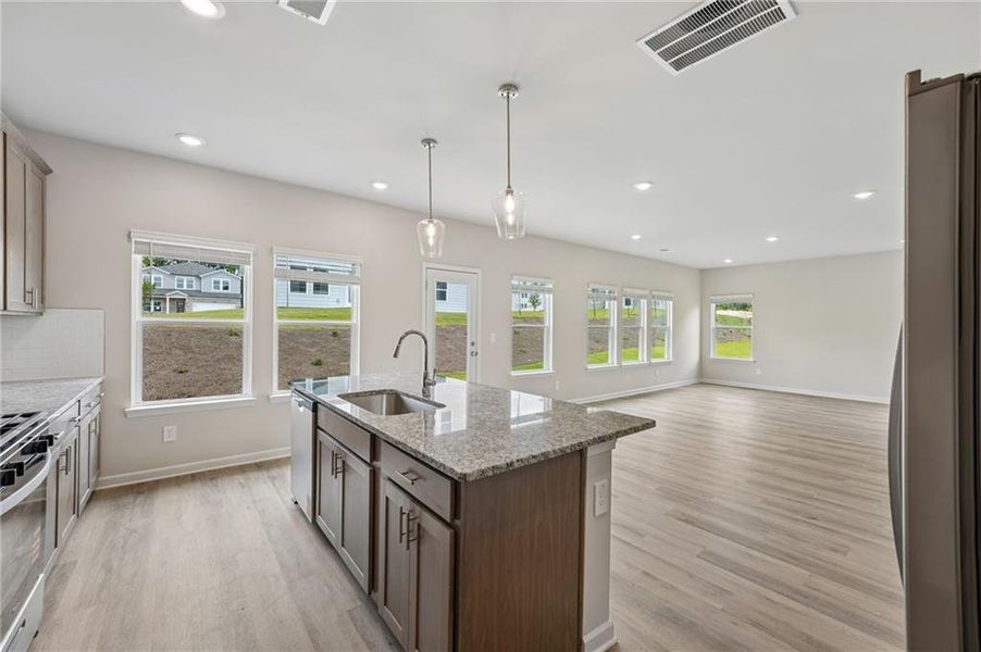 Furnished interior view inside a new home in Northwoods at Mirror Lake, Villa Rica (Image 9).