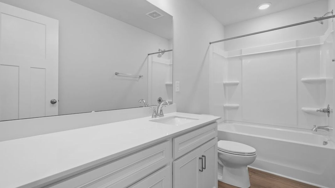 2 story single family home, all white, bathroom