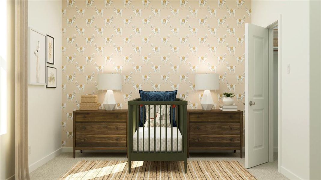 Bedroom with a nursery area and light carpet
