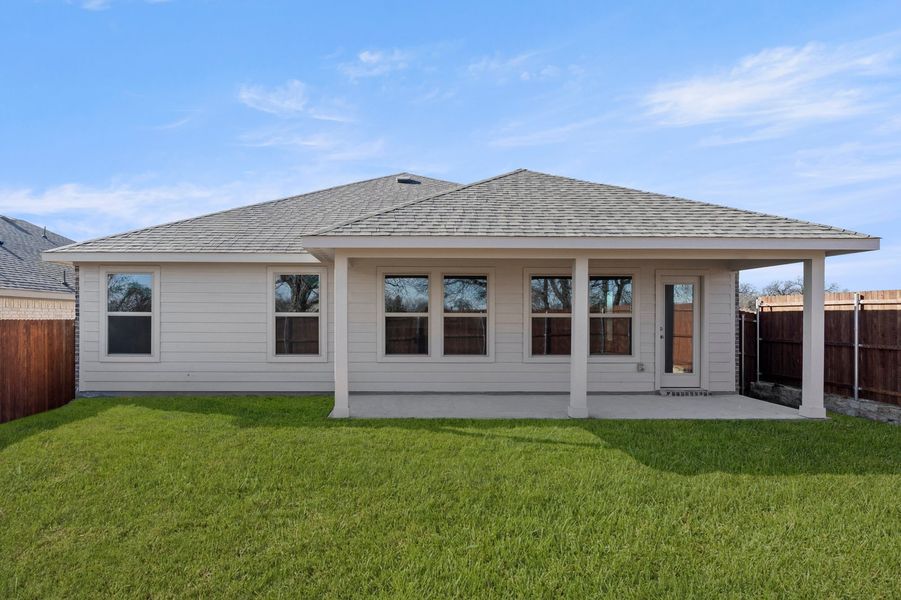 Front exterior of a new home in Belmont, Aubrey, TX, highlighting curb appeal (Image 26). Front exterior of a new home in Belmont, Aubrey, TX, highlighting curb appeal (Image 26).