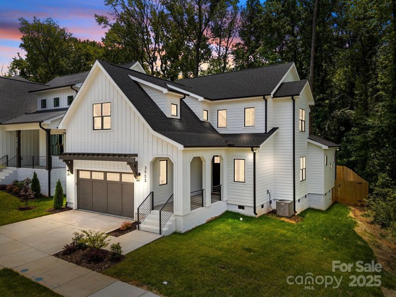 Front exterior of a new home in , Charlotte, NC, highlighting curb appeal (Image 24).