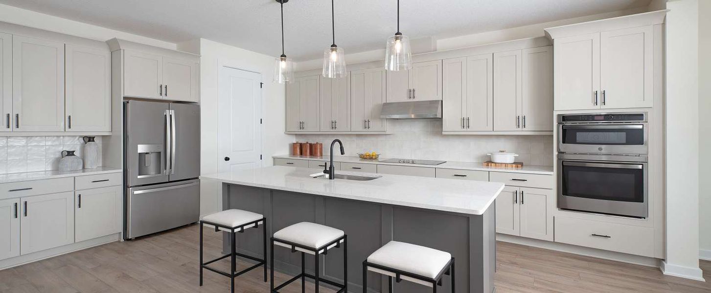 Representative furnished interior of a home built from the Moseley by Ashton Woods in Lake Cawood Cove, Windermere (Image 9).