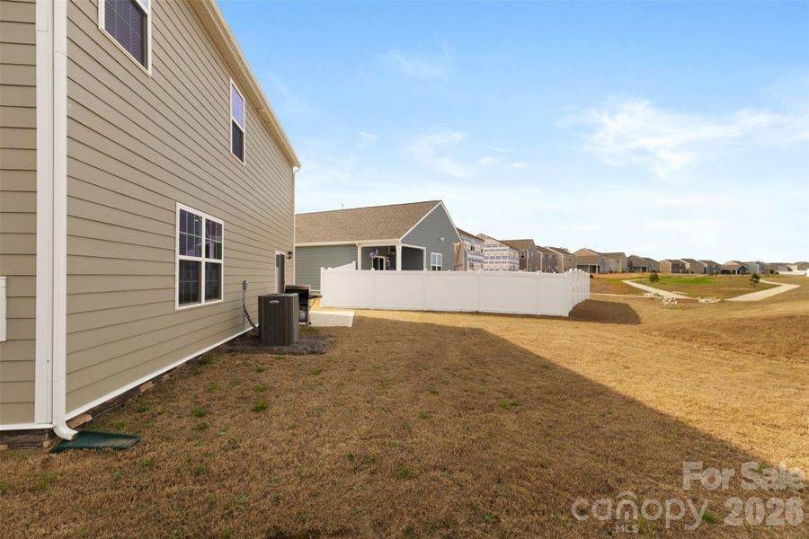 Exterior details and patio area of a home in Secrest Commons, Monroe (Image 2). Exterior details and patio area of a home in Secrest Commons, Monroe (Image 2).