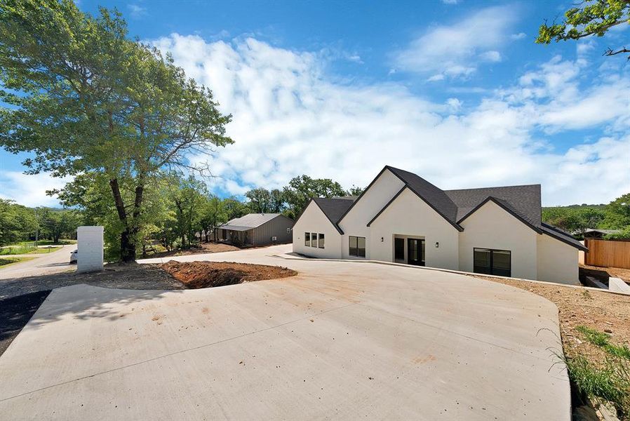 Front exterior of a new home in , Joshua, TX, highlighting curb appeal (Image 23).