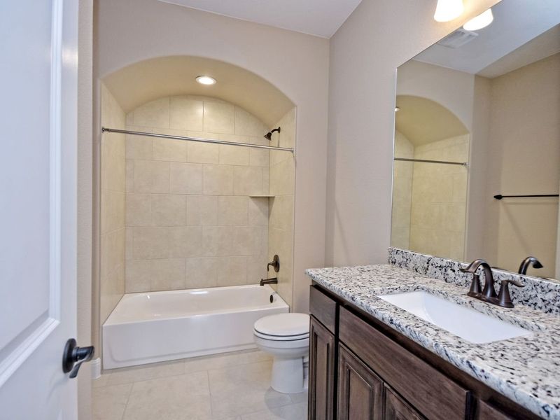 Representative furnished interior of a home built from the Madera II by Giddens Homes in Scofield Farms Estates, Georgetown (Image 249).