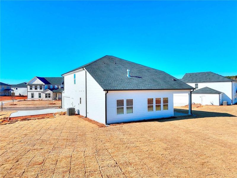 Exterior details and patio area of a home in River Pointe, Monroe (Image 31).