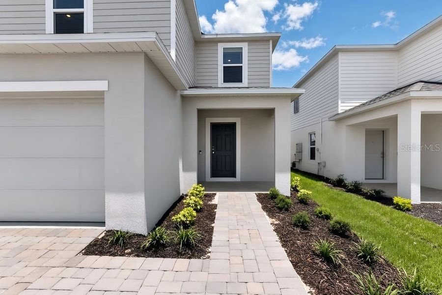 Exterior details and patio area of a home in Waterstone, Groveland (Image 33).