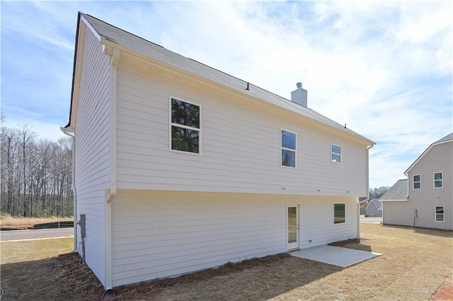 Front exterior of a new home in , Villa Rica, GA, highlighting curb appeal (Image 15). Front exterior of a new home in , Villa Rica, GA, highlighting curb appeal (Image 15).