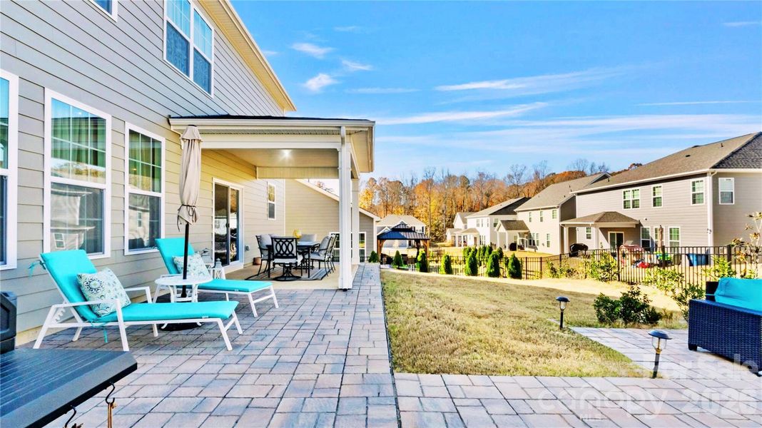 Exterior details and patio area of a home in Sylvan Creek, Denver (Image 25).