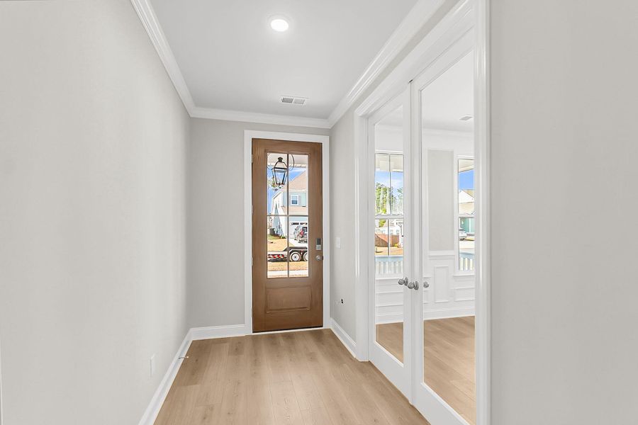 Spacious, unfurnished interior of a new home in Tidewater at Lakes of Cane Bay, Summerville (Image 47).