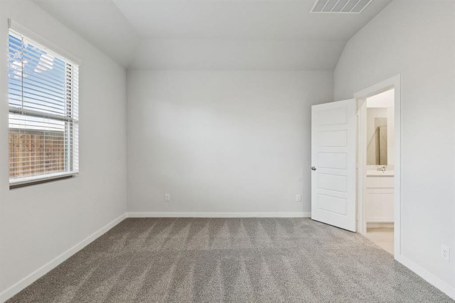 Primary Suite in the Cedar home plan by Trophy Signature Homes – REPRESENTATIVE PHOTO