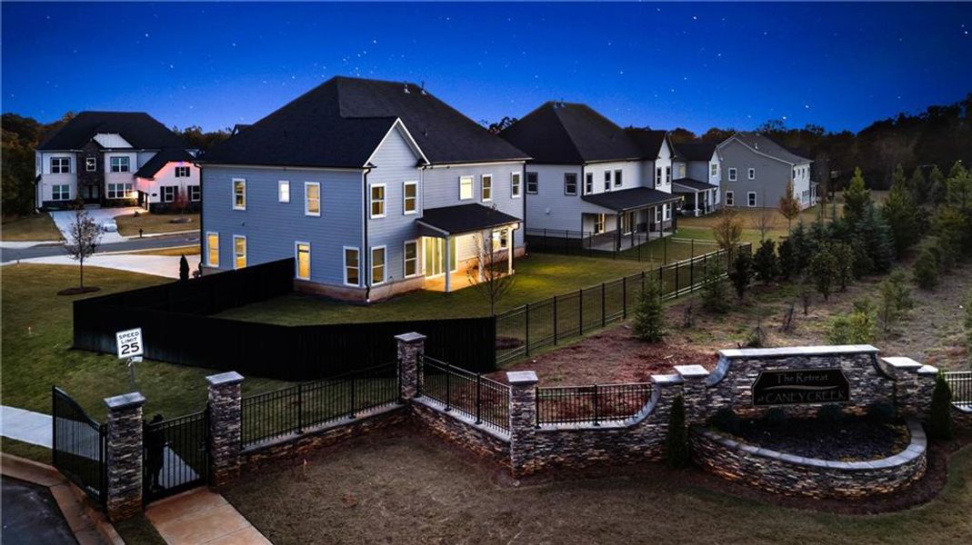 Exterior details and patio area of a home in The Retreat at Caney Creek, Alpharetta (Image 36).