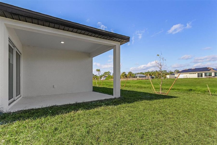 Front exterior of a new home in , North Port, FL, highlighting curb appeal (Image 14). Front exterior of a new home in , North Port, FL, highlighting curb appeal (Image 14).