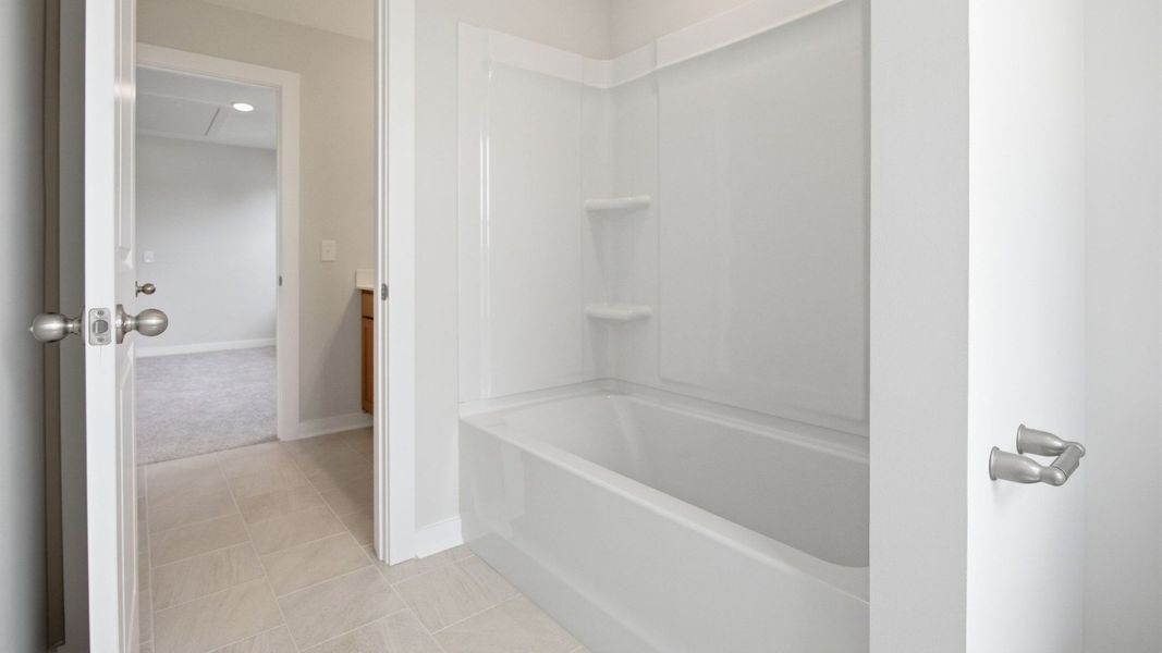 Bathroom with separate area for shower and toilet Bathroom with separate area for shower and toilet