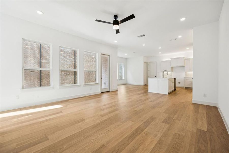 The open and flowing main level in our Madeleine plan make this the perfect family home. The open and flowing main level in our Madeleine plan make this the perfect family home.