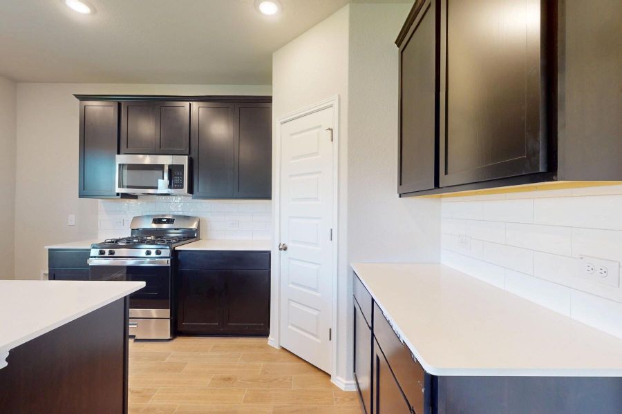 Furnished interior view inside a new home in Cascades at Onion Creek, Austin (Image 10). Furnished interior view inside a new home in Cascades at Onion Creek, Austin (Image 10).