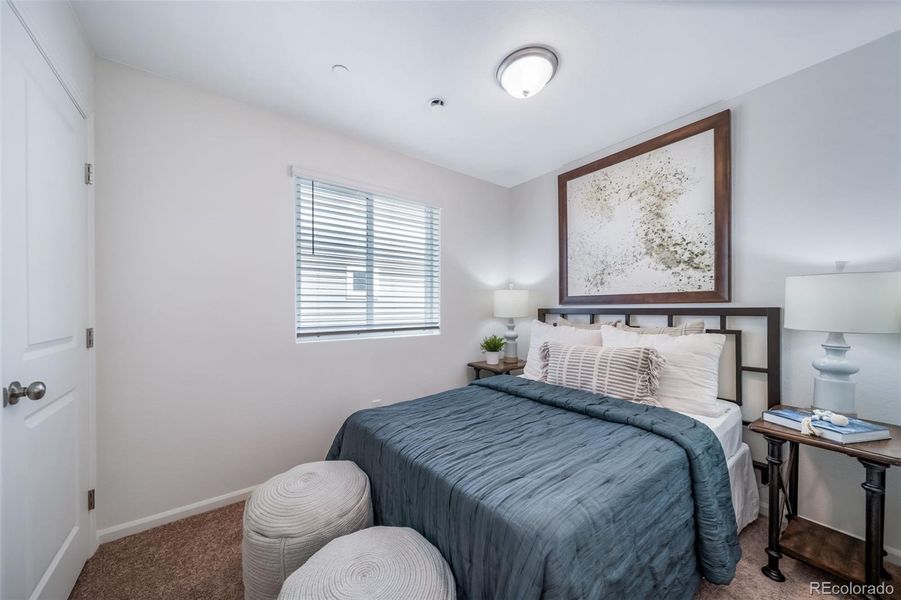 Furnished interior view inside a new home in Reunion, Commerce City (Image 25).