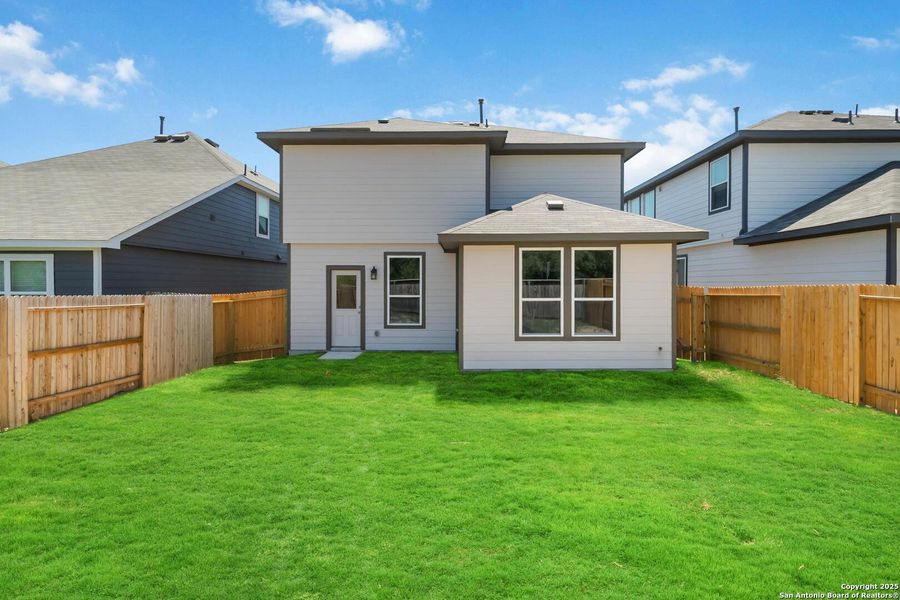 Front exterior of a new home in Timber Creek, San Antonio, TX, highlighting curb appeal (Image 15).